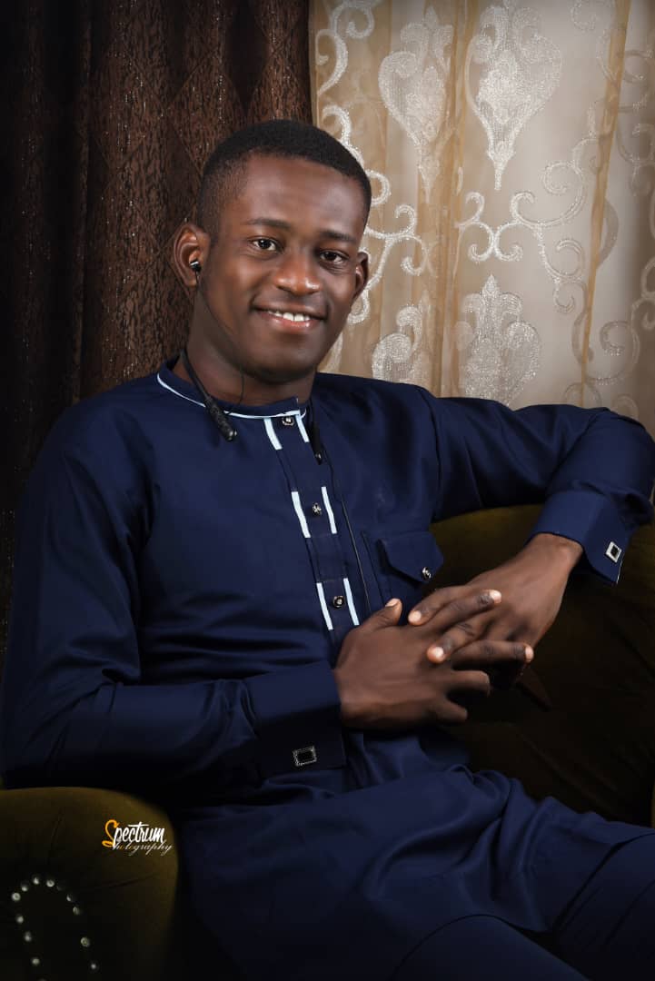 Professional headshot of RAPHAEL ALEMOH the ICT Manager