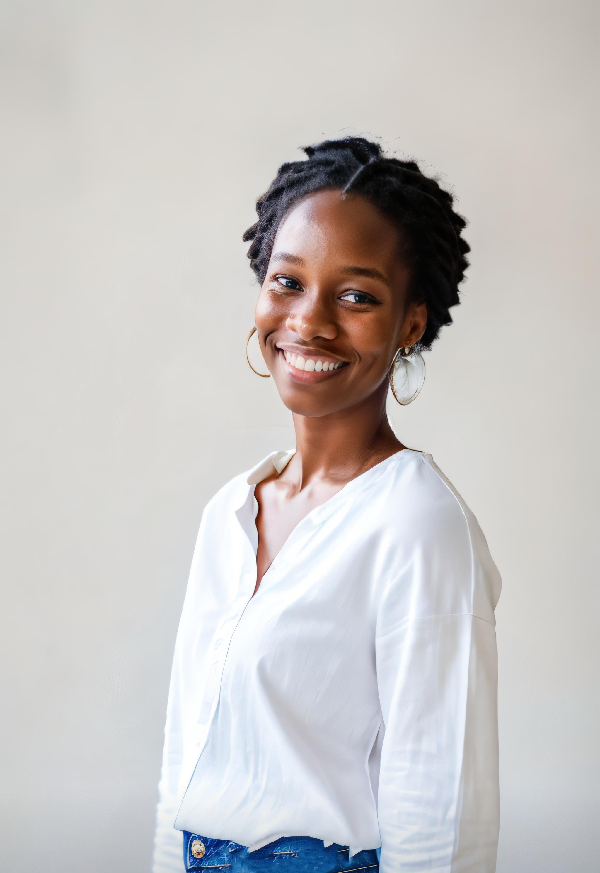 Professional headshot of MISS FAVOUR BARAU the Brand Manager
